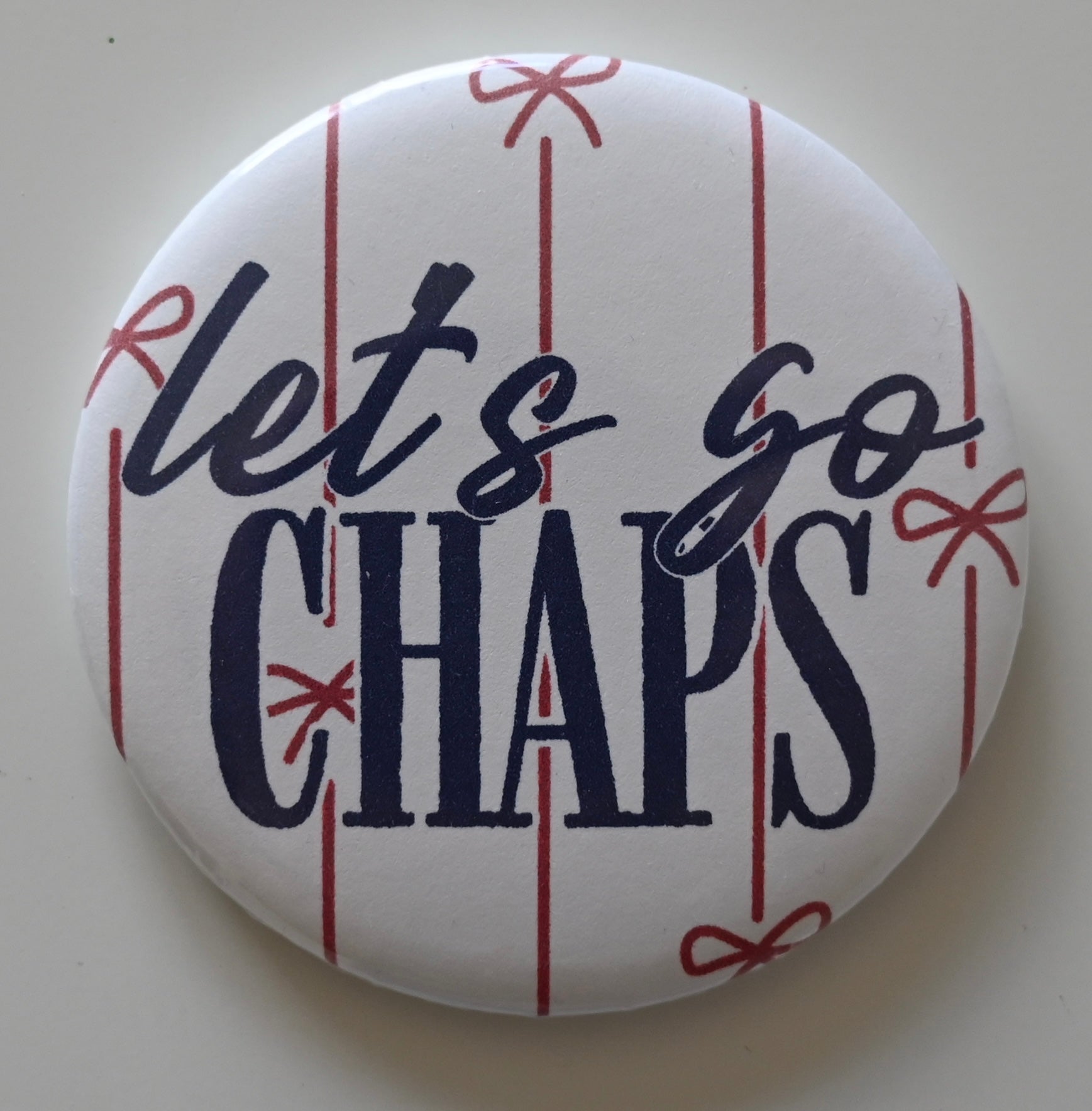 Bow Stripes Let's Go Mascot Button